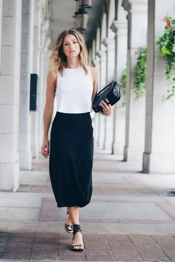 A Woman Wearing Sandals In Los Angeles As Part Of A Business Casual Outfit
