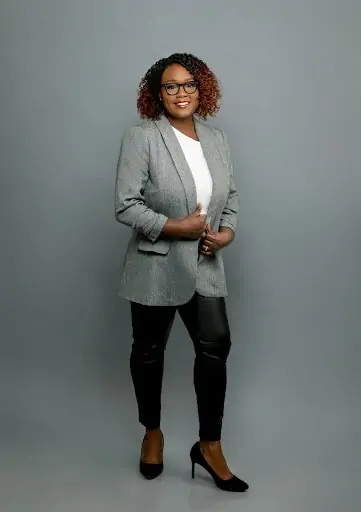 Virtual Image Consulting Services Client Lianne In a Blazer White Blouse Leather Pants And Black Heels