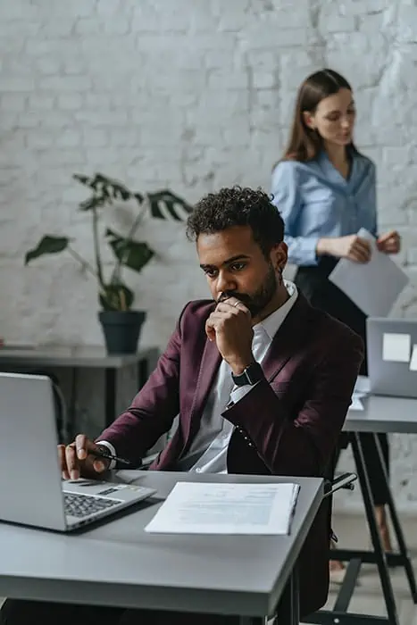 Man-Comtemplating-How-To-Build-His-Personal-Brand-At-Work