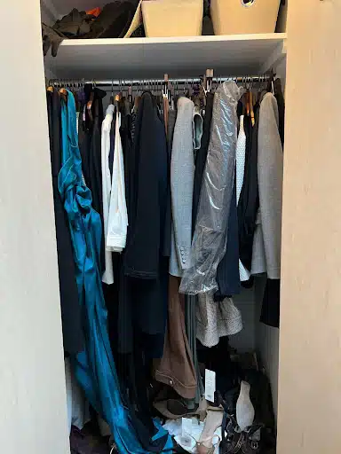 Before image of a 30 year old woman's closet.