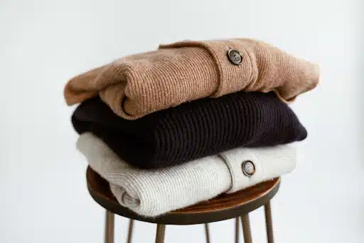 Stack of sweaters for fashion for older women 