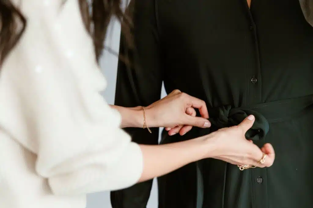 Personal stylist Cassandra Sethis working with a female client.