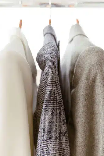 Suits hanging up for workwear essentials

