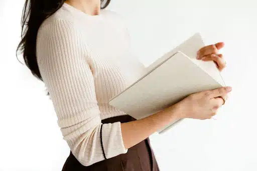 Woman holding notebook