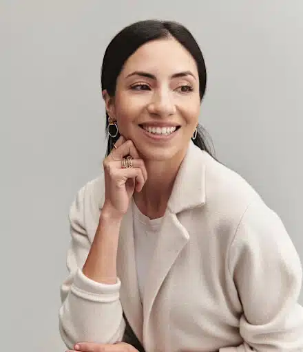 Cassandra Sethi's headshot in a plain white t-shirt