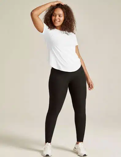 Plain white t-shirt styled in athleisure ensemble