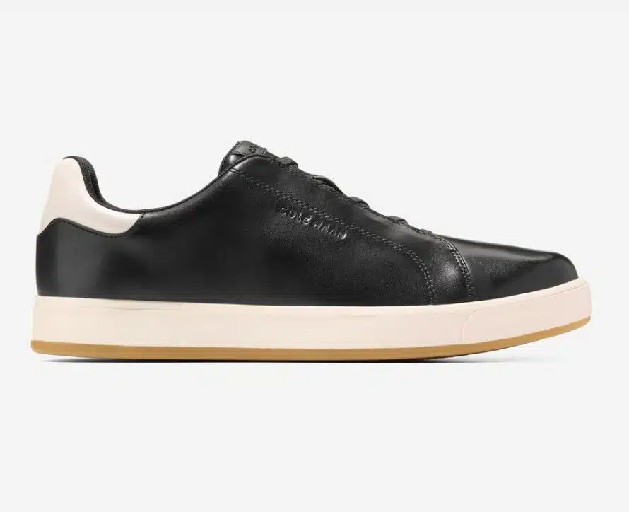 Black leather executive tech shoes by Cole Haan.