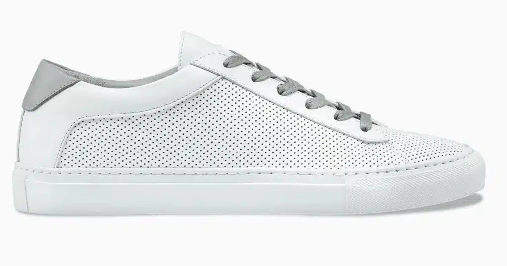 White perforated leather executive tech bro shoes by Koio.