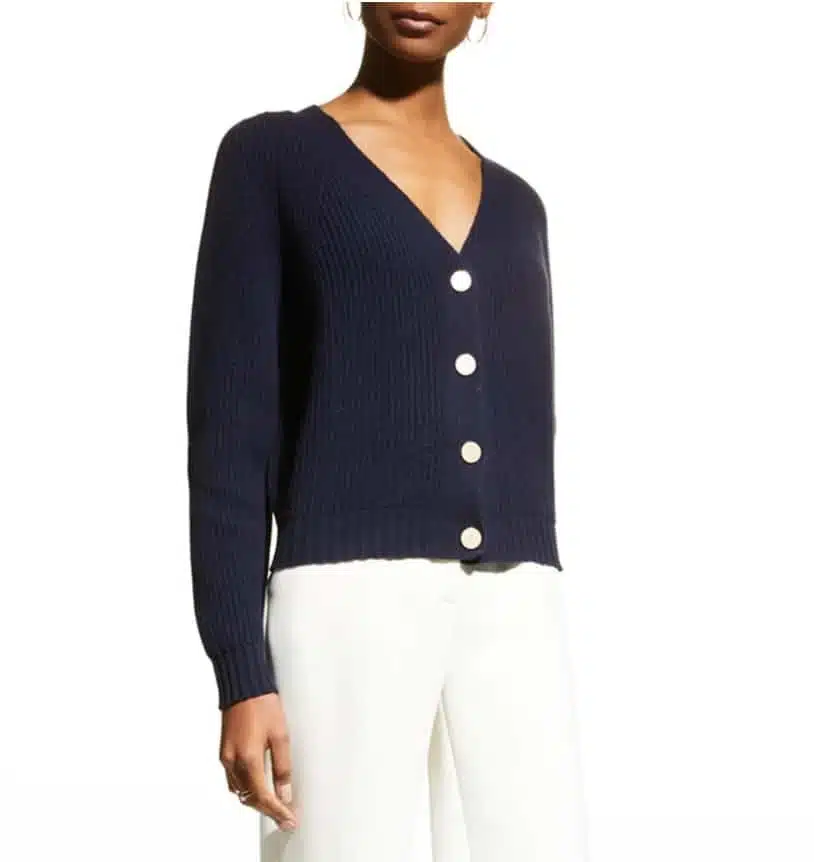 Power casual layered piece: White dress pants and a navy button-down lightweight sweater.